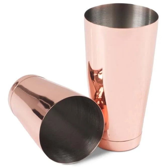 1231 Barfly Copper Cocktail Shaker Set in copper, separate, laying on table sideways on white background.