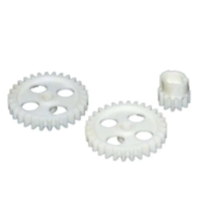 A set of three white plastic gears of different sizes, likely used as replacement parts for a salad spinner U610.