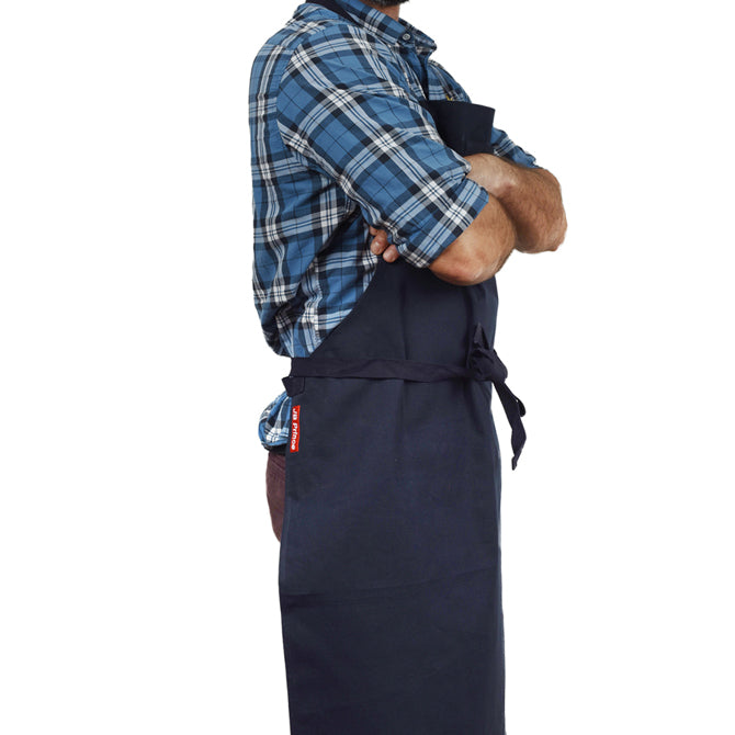JB Prince Navy Blue Apron side view shot on white silo background.
