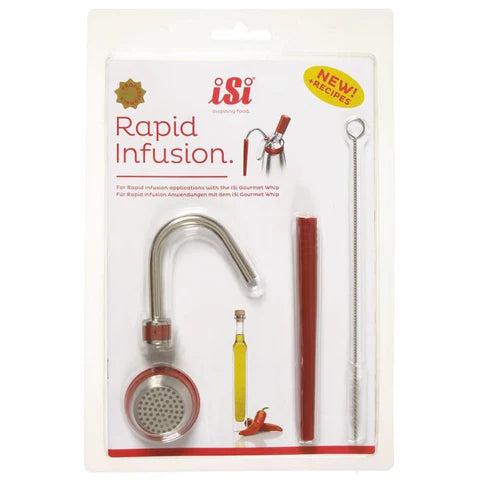 Packaging of iSi Rapid Infusion kit showing the components of the kit through a clear plastic window, including a stainless steel sieve, silicone gasket, silicone tube, and a cleaning brush on white background.