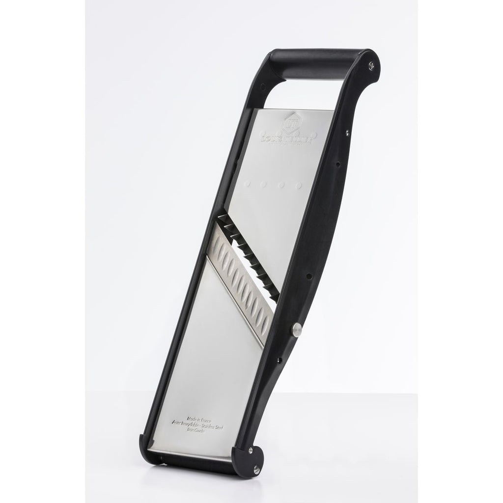 Black and silver vegetable peeler on a white background