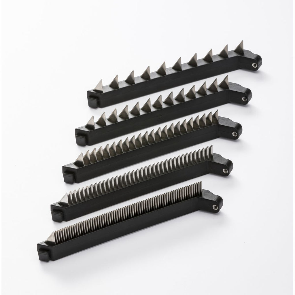 Set of black metal mandolin blades with various designs on a white background