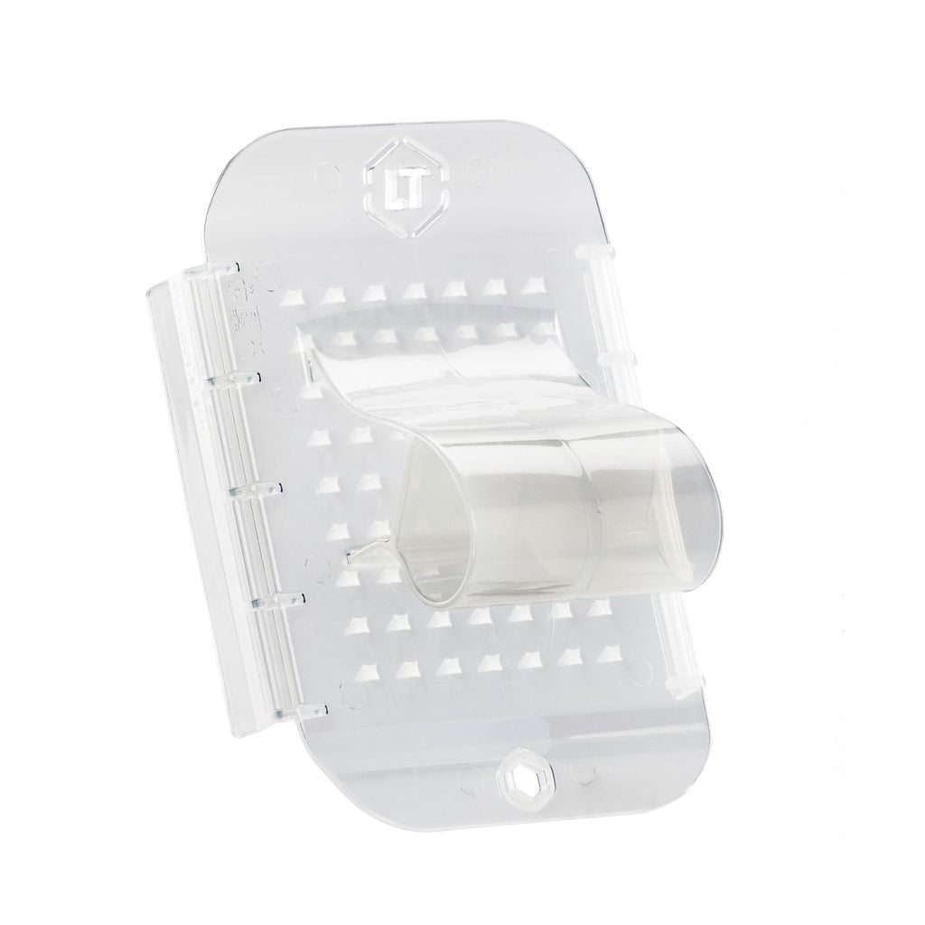 Clear plastic safety tool to slice vegetables on mandolin with a cylindrical component as handle.