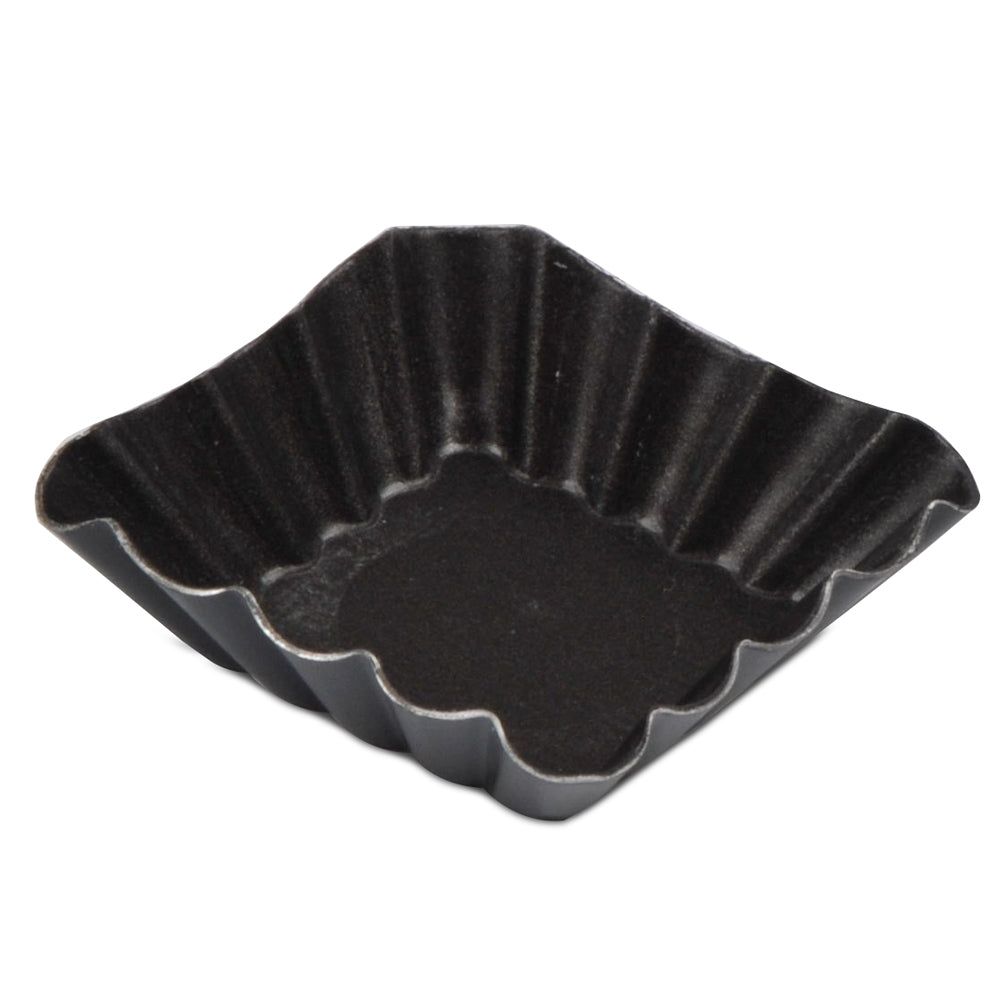 Black square mold on black background.