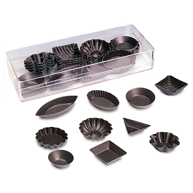 A collection of various shaped non-stick petit four molds displayed outside of a clear storage container, including square, round, fluted round, brioche, rectangle, and triangle molds.