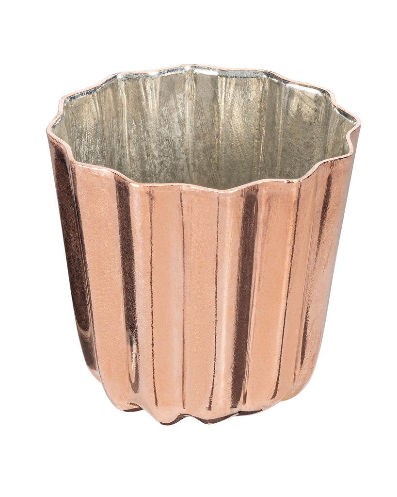 Copper-colored tin mold on a white background