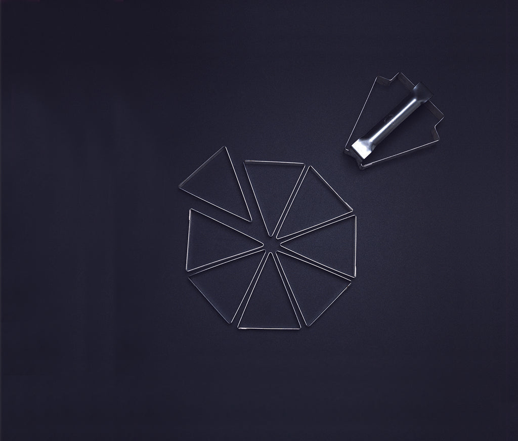 Triangular Tart Mold on a dark background