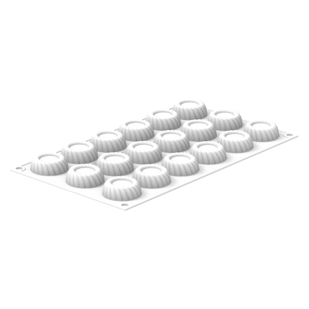 Silicone mold with 18 small dome-shaped cavities on a white background