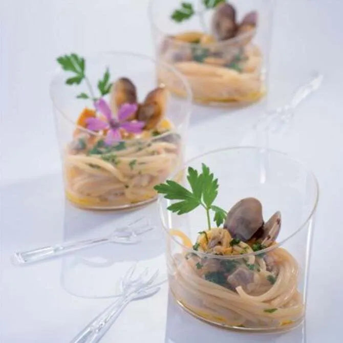 3 Angled Oval Glasses 6.42oz shot bokeh style, filled and  garnished with pasta noodles.