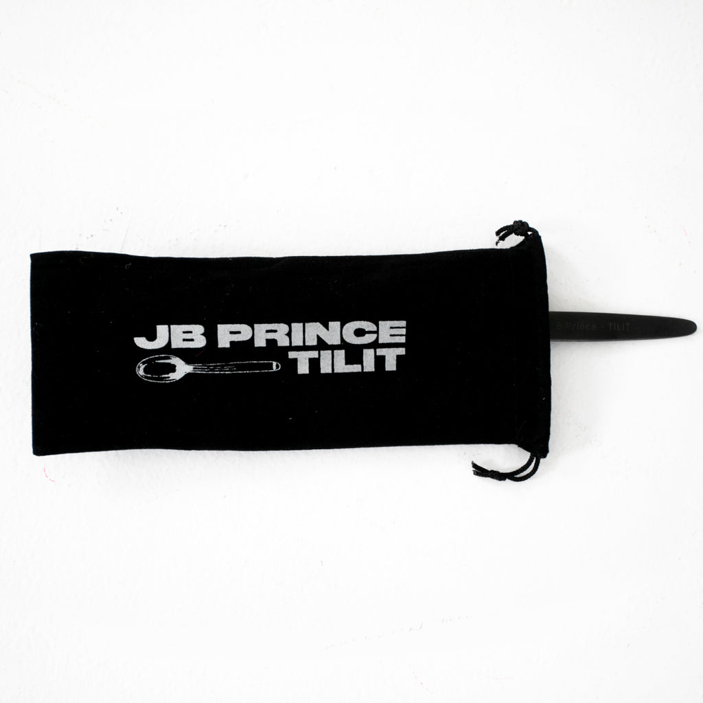 Gray Kunz Spoon: JB Prince x Tilit Edition black spoon within carry pouch showing JB Prince and Tilit Logo.
