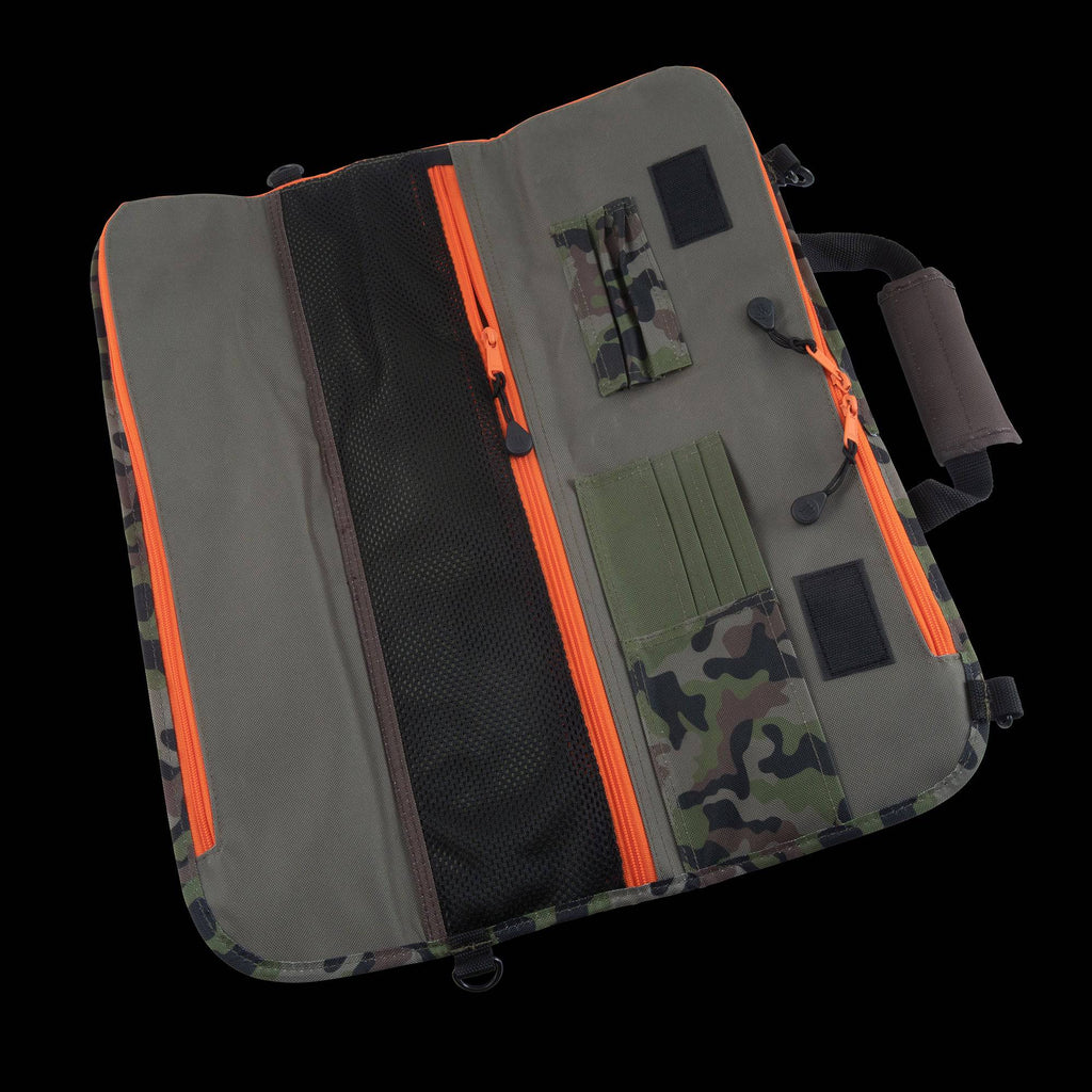 Multifunctional knife roll with camouflage pattern and orange zippers on a black background