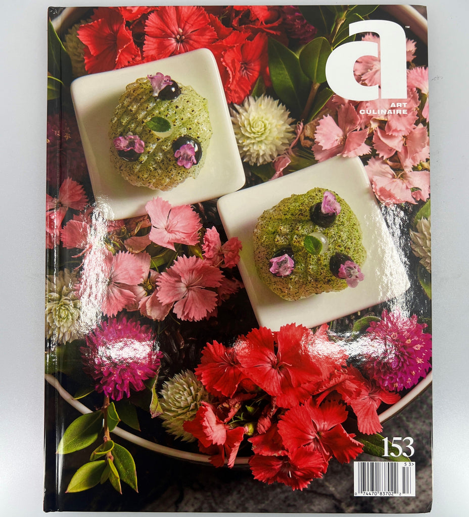 Magazine cover with food and flowers on a white background