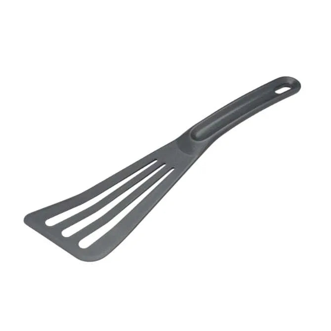 A black slotted spatula designed for professional kitchen use, with a flexible edge and slotted design for turning fish or omelets and draining fat.